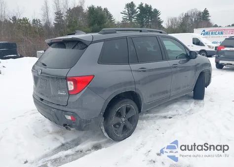 2019 Honda Passport Elite z USA, uszkodzony, nr VIN 5FNYF8H04KB005095
